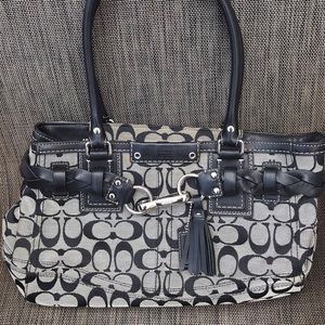 Authentic leather coach.